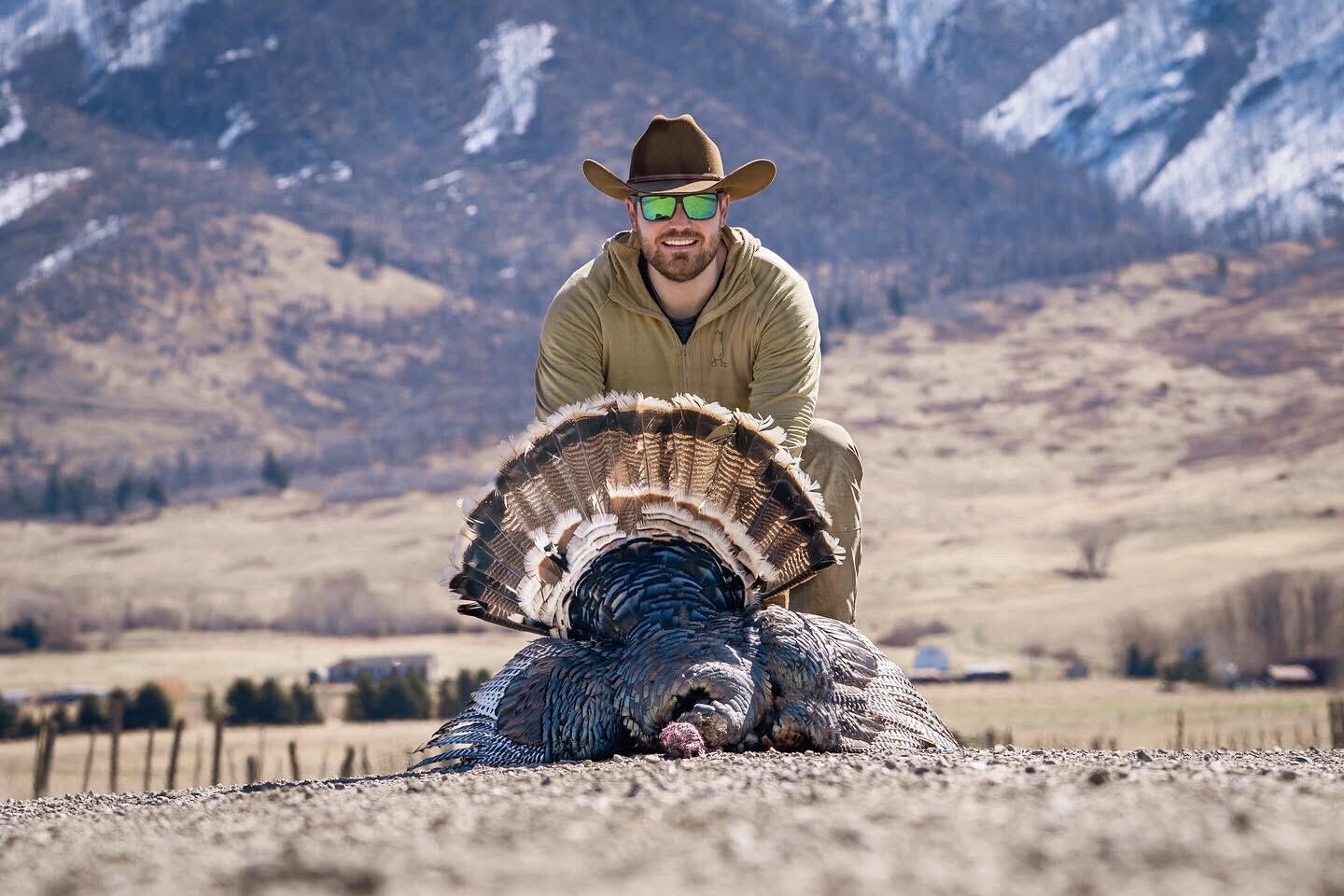 A hunter shows off his turkey hunting success. 