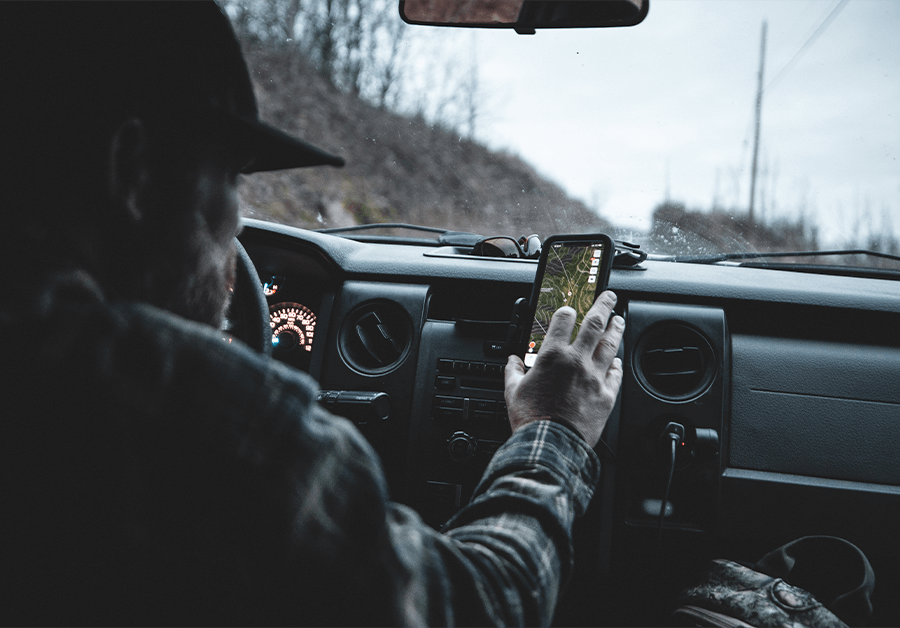 Josh, from The Untamed, using HuntWise to navigate mountain roads and access point, hunting black bears. 