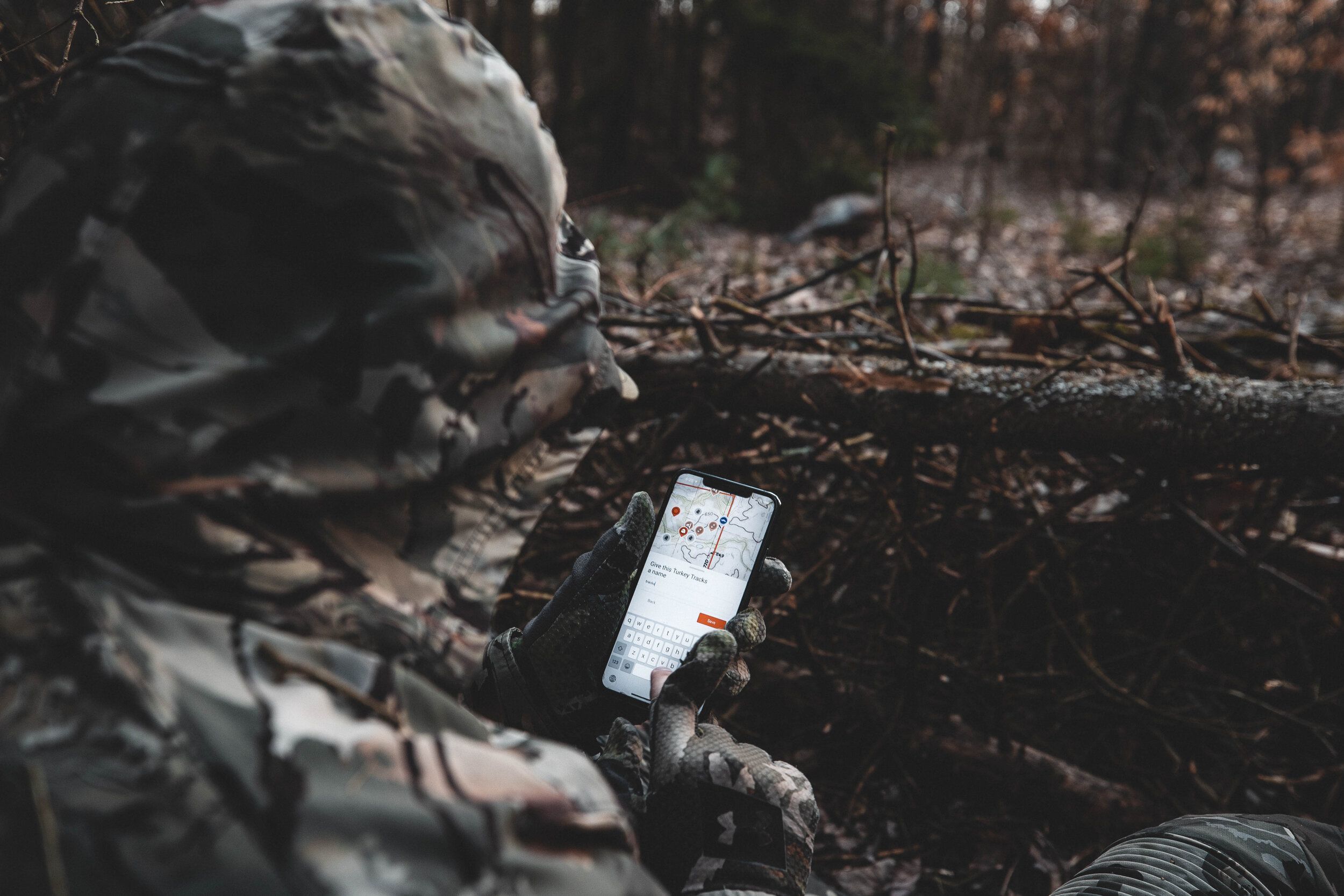 A turkey hunter uses markers in the HuntWise app. 